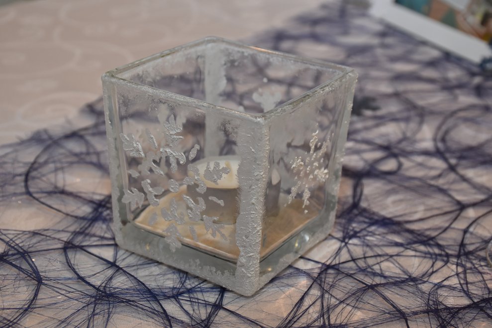 Dekoration Glas mit Kerze.