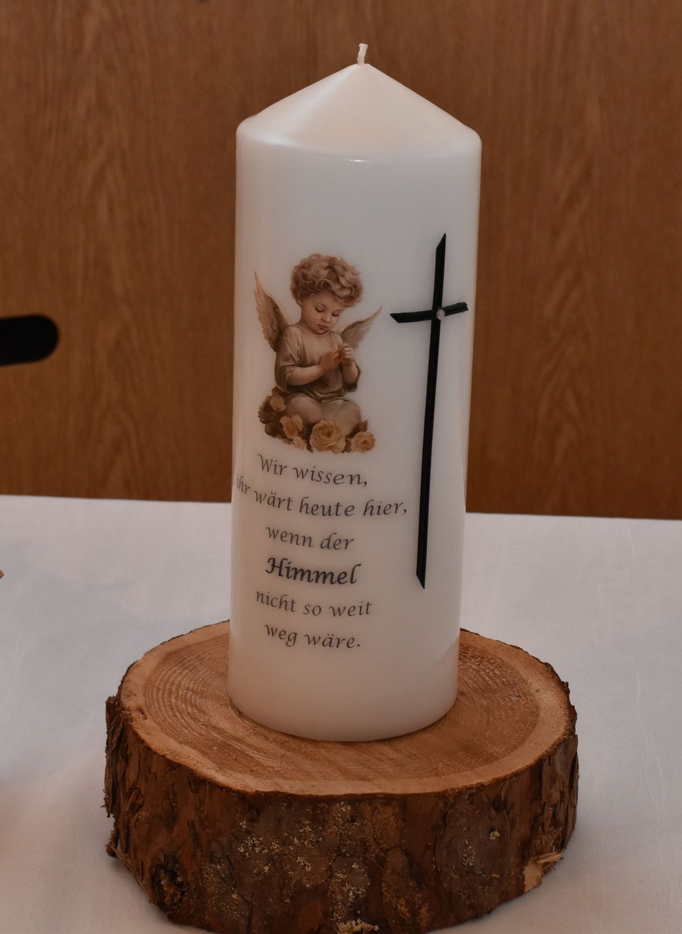 Kerze mit Spruch.